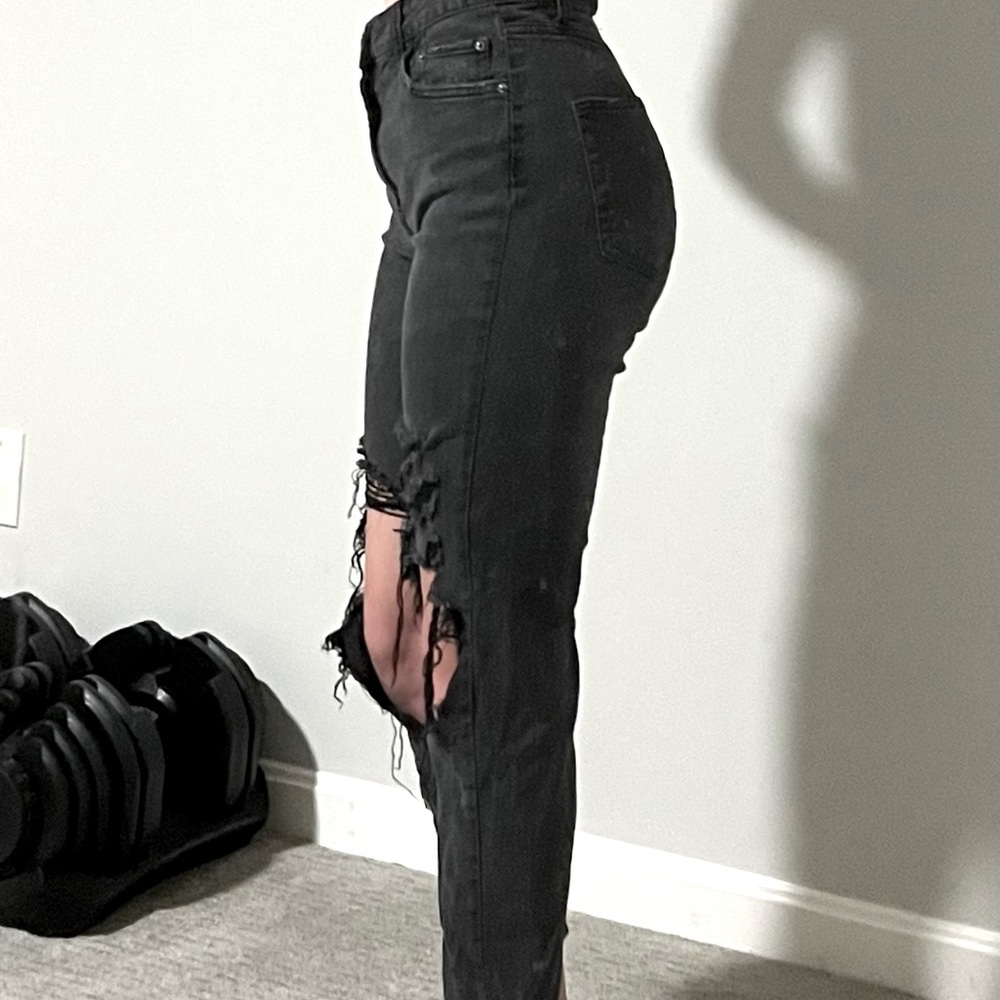 black ripped jeans
